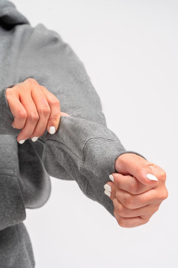 Graphite Blank Hoodies woman showing material and stretch